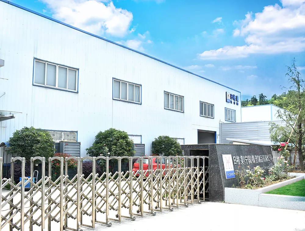At the gate of the factory